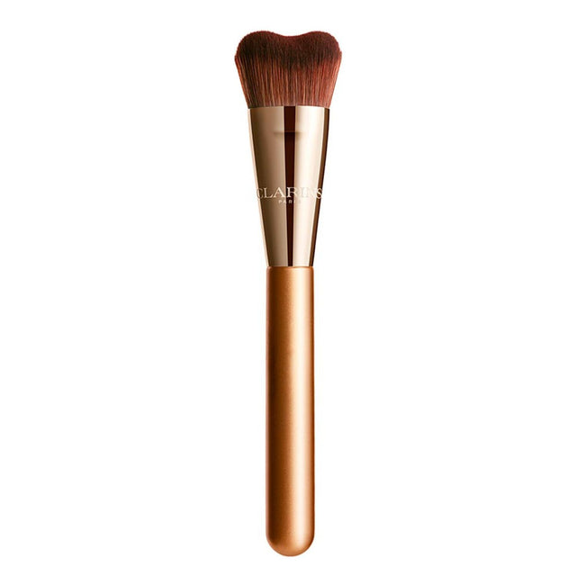 Pinceau Fond de Teint Clarins inspiré du Gua Sha